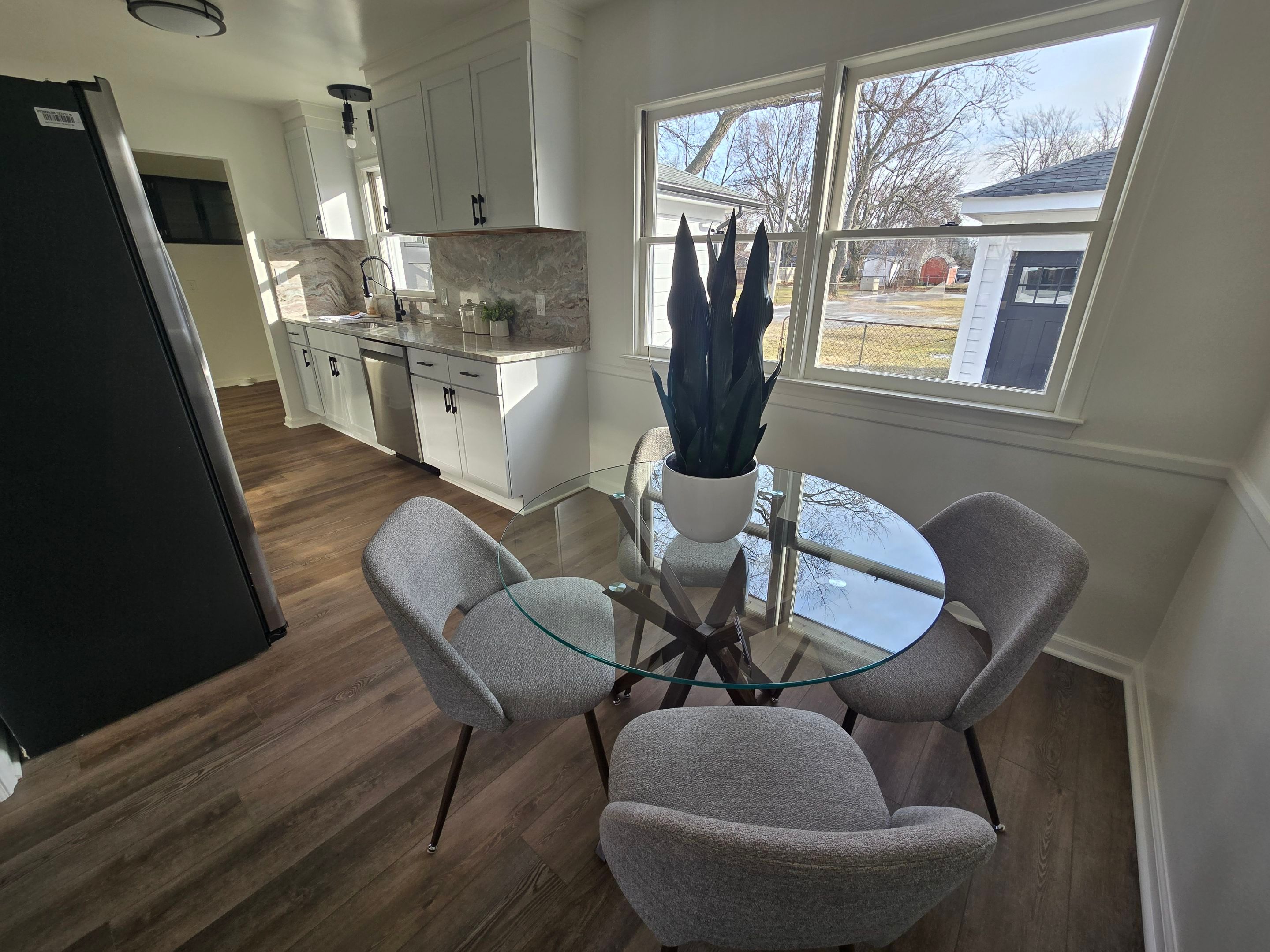 Finished kitchen and dining area in a residential renovation